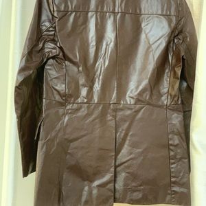 The leather shop Sears vintage brown leather jacket.